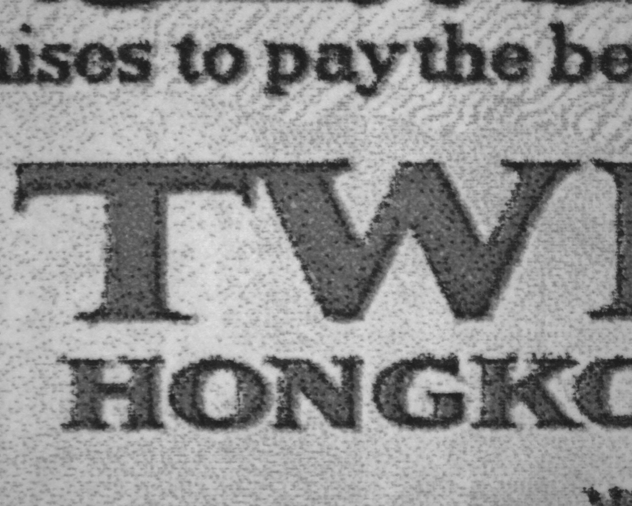 Ingrandimento dei caratteri e della trama di stampa di una banconota contraffatta da 20 dollari di Hong Kong